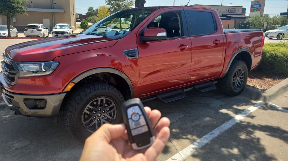 Key fob programmed for a Ford Ranger Tremor truck in a DFW parking lot